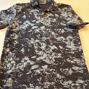 Travis Mathew Black Polo with Leafy Green Print